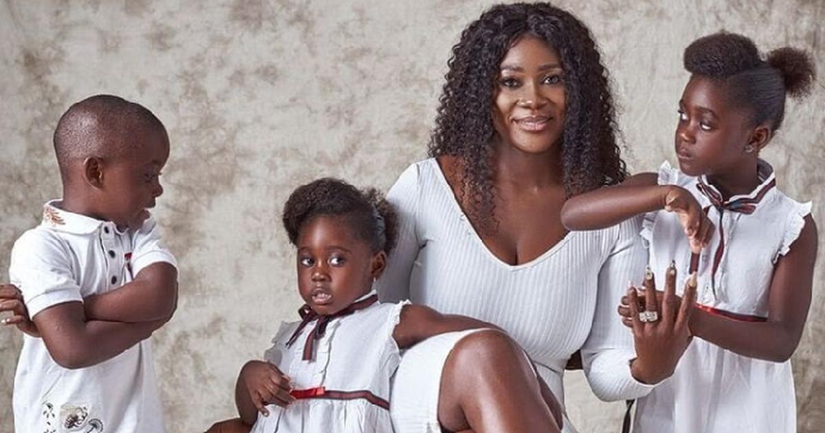 Mercy Johnson cradles her growing baby bump in new photos